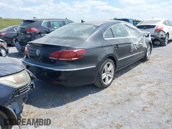 2015 Volkswagen CC R-Line with VIN WVWBP7AN9FE823240, listed as a IAAI auction lot 41697065 with Not Provided miles and . Bid and sale history available at DreamBid. Image 4.