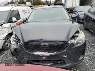 2014 Mazda CX-5 Sport with VIN JM3KE4BE0E0428322, listed as a Copart auction lot 56012495 with 278,146 mi miles and Salvage title. Bid and sale history available at DreamBid. Image 5.