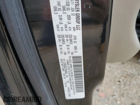 2012 Dodge Grand Caravan SE with VIN 2C4RDGBG1CR402831, listed as a Copart auction lot 50539325 with 177,553 mi miles and Salvage Title. Bid and sale history available at DreamBid. Image 16.
