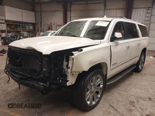 2015 GMC Yukon XL Denali with VIN 1GKS2JKJ1FR635901, listed as a IAAI auction lot 41805739 with 120,998 mi miles and . Bid and sale history available at carsss.com. Image 18.