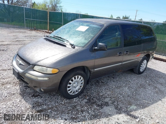 1999 Chrysler Town & Country LXi with VIN 1C4GP54LXXB553393, listed as a IAAI auction lot 41968605 with 256,400 mi miles. Bid and sale history available at carsss.com. Image 2.