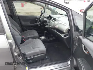 2009 Honda Fit with VIN JHMGE88279S055565, listed as a IAAI auction lot 41896359 with 184,618 mi miles. Bid and sale history available at carsss.com. Image 5.