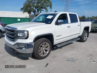 2017 GMC Sierra 1500 SLT with VIN 3GTP1NECXHG423591, listed as a IAAI auction lot 41509177 with 100,071 mi miles and . Bid and sale history available at DreamBid. Image 18.