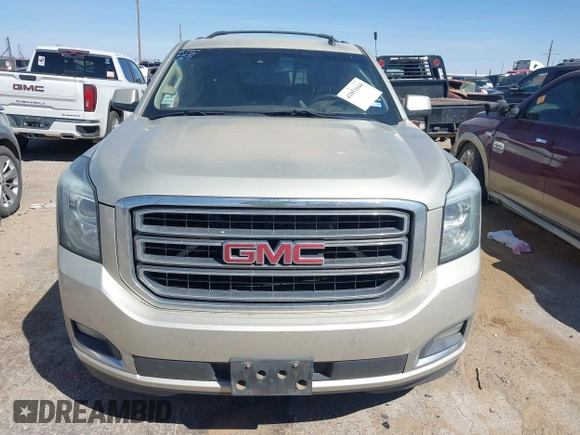 2015 GMC Yukon SLT with VIN 1GKS1BKC1FR145694, listed as a IAAI auction lot 41851644 with 162,592 mi miles. Bid and sale history available at carsss.com. Image 12.