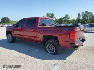 2018 Chevrolet Silverado 1500 LT with VIN 3GCUKREC5JG203272, listed as a Copart auction lot 61239994 with 82,485 mi miles and Salvage Title. Bid and sale history available at carsss.com. Image 2.