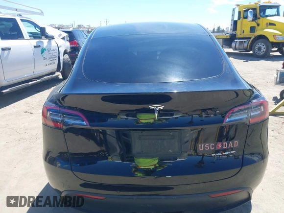 2020 Tesla Model Y Long Range with VIN 5YJYGDEE2LF059177, listed as a IAAI auction lot 41916260 with 66,190 mi miles and . Bid and sale history available at DreamBid. Image 16.