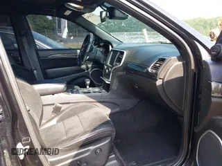 2014 Jeep Grand Cherokee SRT-8 z VIN 1C4RJFDJ2EC174412, wystawiony jako IAAI lot #42116541 z przebiegiem 124 693 mil mil oraz . Historia ofert i sprzedaży dostępna na DreamBid. Obrazek 5.