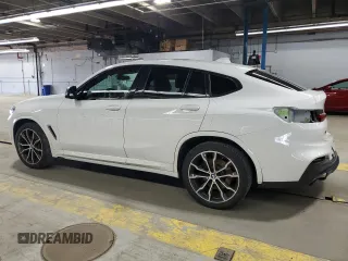 2019 BMW X4 M40i z VIN 5UXUJ5C55KLJ64198, wystawiony jako Copart lot #53028815 z przebiegiem 59 780 mil mil oraz Szkody całkowita. Historia ofert i sprzedaży dostępna na DreamBid. Obrazek 2.