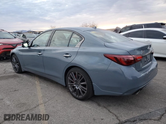 2024 Infiniti Q50 Red Sport 400 with VIN JN1FV7DPXRM660535, listed as a Copart auction lot 82416994 with 2,822 mi miles and Salvage Title. Bid and sale history available at DreamBid. Image 2.