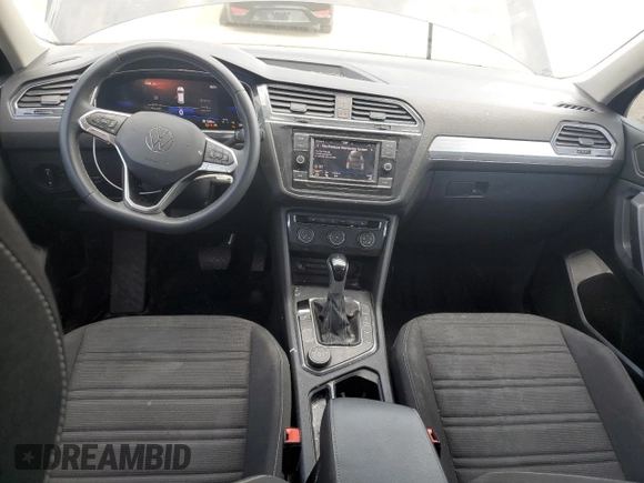 2023 Volkswagen Tiguan S with VIN 3VVFB7AX5PM082907, listed as a Copart auction lot 63643445 with 36,521 mi miles and Salvage title. Bid and sale history available at DreamBid. Image 8.