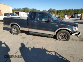 2000 Ford F-150 XL with VIN 1FTRX17L4YNA56465, listed as a Copart auction lot 42381515 with 0 mi miles and Salvage Title. Bid and sale history available at carsss.com. Image 4.