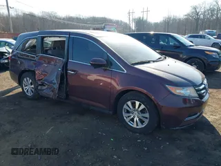2014 Honda Odyssey EX-L with VIN 5FNRL5H60EB009083, listed as a IAAI auction lot 41633419 with 219,930 mi miles and . Bid and sale history available at carsss.com. Image 1.