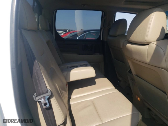2009 Honda Ridgeline RTL with VIN 5FPYK16589B100942, listed as a Copart auction lot 69424014 with 211,003 mi miles and Salvage Title. Bid and sale history available at carsss.com. Image 10.