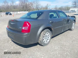 2008 Chrysler 300 LX with VIN 2C3KA43R18H122398, listed as a IAAI auction lot 41960956 with 240,960 mi miles. Bid and sale history available at carsss.com. Image 4.
