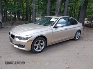 2013 BMW 3 Series 328i xDrive with VIN WBA3B5G53DNP40721, listed as a IAAI auction lot 42614545 with 102,570 mi miles and . Bid and sale history available at DreamBid. Image 2.