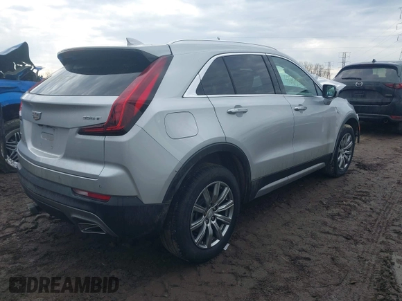 2022 Cadillac XT4 AWD Premium Luxury with VIN 1GYFZDR43NF152561, listed as a IAAI auction lot 41669571 with 16,274 mi miles and . Bid and sale history available at carsss.com. Image 4.