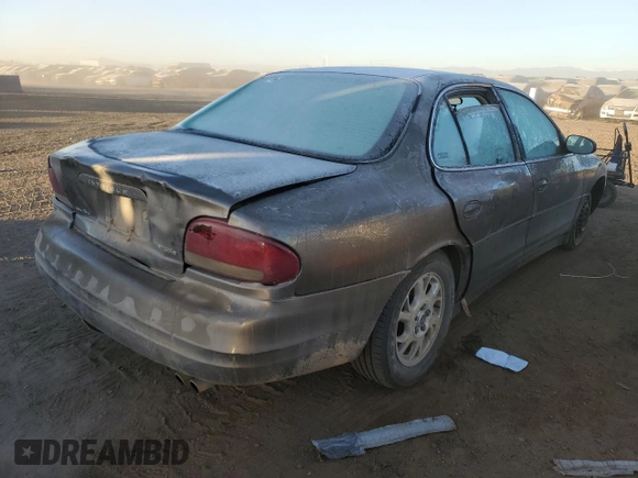 2002 Oldsmobile Intrigue GX z VIN 1G3WH52HX2F253040, wystawiony jako Copart lot #85429974 z przebiegiem 252 469 mil mil oraz Szkoda całkowita • Salvage title. Historia ofert i sprzedaży dostępna na DreamBid. Obrazek 3.