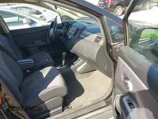 2009 Nissan Versa 1.8 S with VIN 3N1BC13E39L409657, listed as a IAAI auction lot 41981554 with 146,675 mi miles. Bid and sale history available at carsss.com. Image 5.