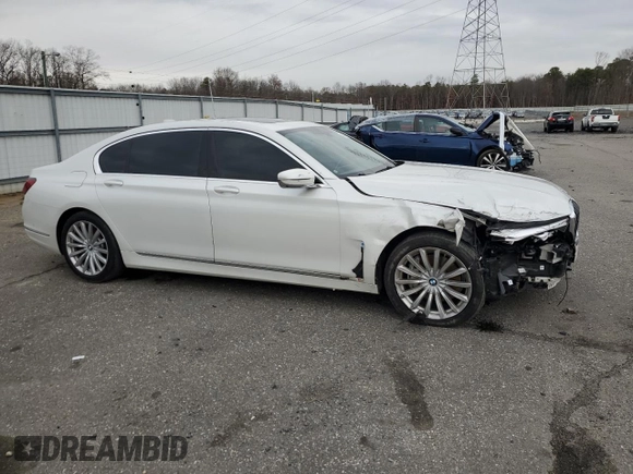 2020 BMW 7 Series 740i with VIN WBA7T2C02LCE43427, listed as a Copart auction lot 84253634 with 61,180 mi miles and Salvage Title. Bid and sale history available at carsss.com. Image 4.