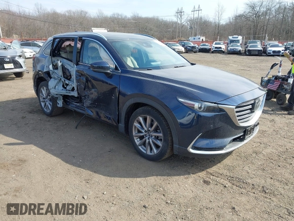 2021 Mazda CX-9 Grand Touring with VIN JM3TCBDY7M0540359, listed as a IAAI auction lot 41711366 with 47,391 mi miles and . Bid and sale history available at carsss.com. Image 1.