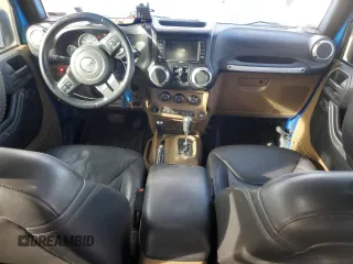 2015 Jeep Wrangler Unlimited Altitude with VIN 1C4BJWEG1FL514848, listed as a Copart auction lot 86474114 with 84,349 mi miles and Salvage title. Bid and sale history available at DreamBid. Image 8.