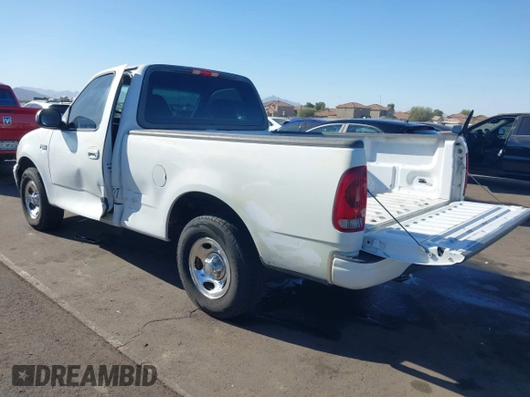 2003 Ford F-150 XL with VIN 1FTRF17293NA46808, listed as a IAAI auction lot 41156923 with 384,475 mi miles and . Bid and sale history available at DreamBid. Image 3.