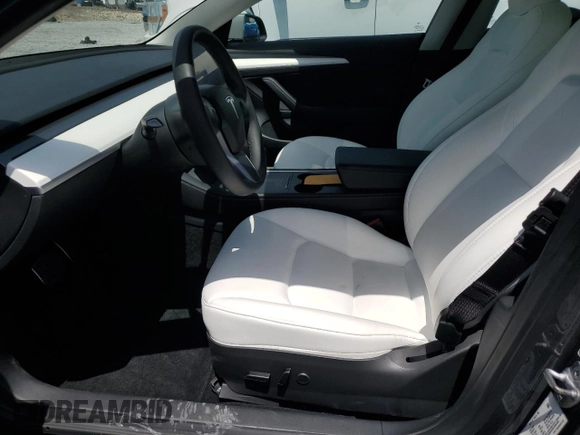 2023 Tesla Model 3 z VIN 5YJ3E1EA0PF571943, wystawiony jako Copart lot #58338235 z przebiegiem 41 584 mil mil oraz Szkoda całkowita • Salvage title. Historia ofert i sprzedaży dostępna na DreamBid. Obrazek 7.