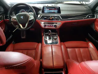 2017 BMW 7 Series 750i with VIN WBA7F0C31HGM22359, listed as a Copart auction lot 56306875 with 90,642 mi miles and Salvage title. Bid and sale history available at DreamBid. Image 8.