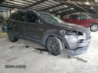 2015 Jeep Cherokee Latitude z VIN 1C4PJLCB9FW531603, wystawiony jako Copart lot #57490915 z przebiegiem 186 155 mil mil oraz Nie do naprawy • Non repairable. Historia ofert i sprzedaży dostępna na DreamBid. Obrazek 4.