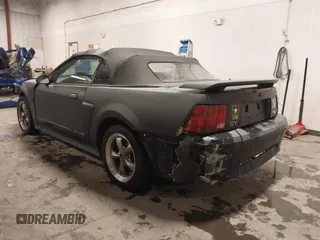 2002 Ford Mustang GT Deluxe z VIN 1FAFP45X92F176117, wystawiony jako IAAI lot #41619448 z przebiegiem 178 787 mil mil oraz . Historia ofert i sprzedaży dostępna na DreamBid. Obrazek 3.