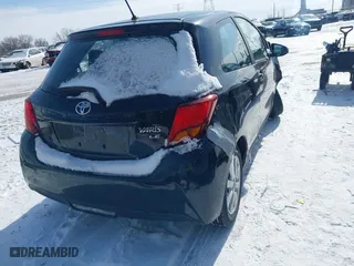 2015 Toyota Yaris L with VIN VNKJTUD34FA055116, listed as a IAAI auction lot 41601874 with 84,508 mi miles. Bid and sale history available at carsss.com. Image 4.