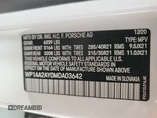 2021 Porsche Cayenne z VIN WP1AA2AY0MDA03642, wystawiony jako Copart lot #47849765 z przebiegiem 60 787 mil mil oraz Szkoda całkowita • Salvage title. Historia ofert i sprzedaży dostępna na DreamBid. Obrazek 13.