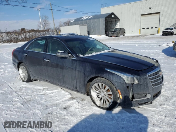 2015 Cadillac CTS Luxury AWD with VIN 1G6AX5SX5F0142864, listed as a Copart auction lot 44492445 with 87,199 mi miles and Salvage Title. Bid and sale history available at DreamBid. Image 4.