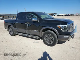 2020 Nissan Titan Platinum Reserve with VIN 1N6AA1EF2LN500797, listed as a Copart auction lot 41897765 with 90,060 mi miles and Salvage title. Bid and sale history available at DreamBid. Image 4.
