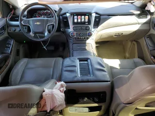 2015 Chevrolet Suburban LTZ with VIN 1GNSKKKC2FR634654, listed as a Copart auction lot 50337415 with 150,255 mi miles and Salvage Title. Bid and sale history available at DreamBid. Image 8.