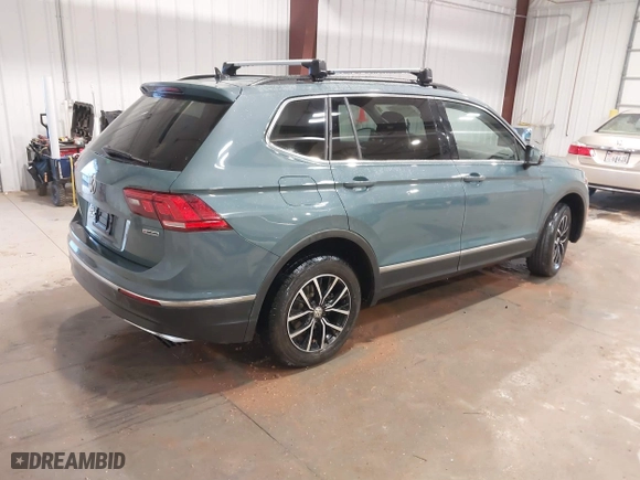 2021 Volkswagen Tiguan SE with VIN 3VV2B7AX6MM077337, listed as a IAAI auction lot 41345637 with 62,989 mi miles. Bid and sale history available at carsss.com. Image 4.