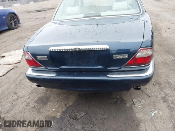 1998 Jaguar XJ Vanden Plas with VIN SAJKX6246WC832202, listed as a IAAI auction lot 41218807 with 96,589 mi miles and . Bid and sale history available at DreamBid. Image 16.