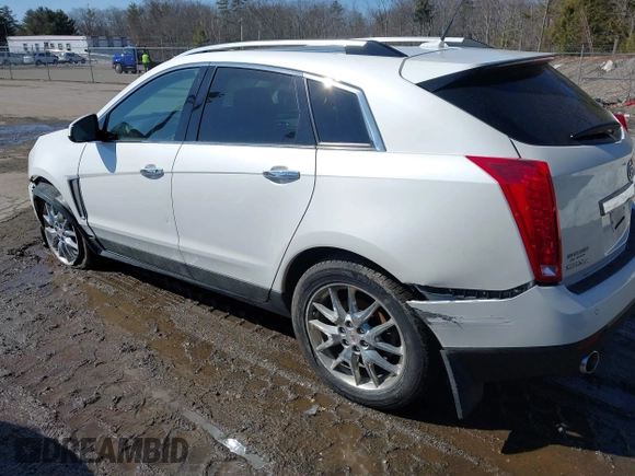 2014 Cadillac SRX Performance Collection with VIN 3GYFNFE30ES586713, listed as a IAAI auction lot 41791356 with 74,927 mi miles and . Bid and sale history available at DreamBid. Image 3.