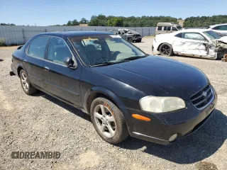 2000 Nissan Maxima GXE z VIN JN1CA31D6YT762114, wystawiony jako Copart lot #57908775 z przebiegiem 207 805 mil mil oraz Szkody całkowita. Historia ofert i sprzedaży dostępna na DreamBid. Obrazek 4.
