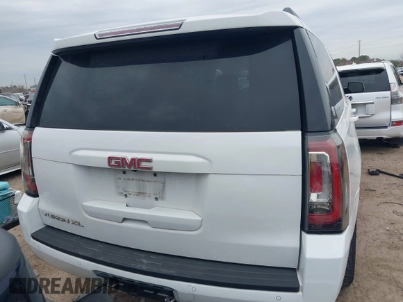 2015 GMC Yukon XL SLT with VIN 1GKS1HKCXFR652337, listed as a IAAI auction lot 41330287 with 139,268 mi miles. Bid and sale history available at carsss.com. Image 17.