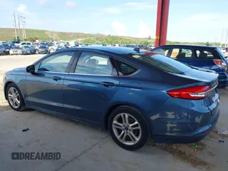 2018 Ford Fusion SE z VIN 3FA6P0HD8JR201052, wystawiony jako IAAI lot #42367050 z przebiegiem 90 502 mil mil oraz . Historia ofert i sprzedaży dostępna na DreamBid. Obrazek 14.
