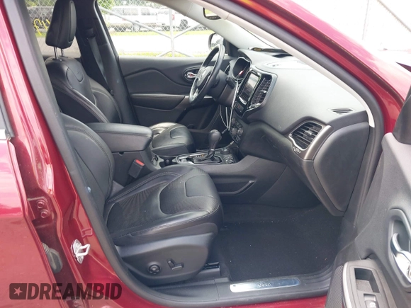 2019 Jeep Cherokee Limited with VIN 1C4PJMDXXKD323087, listed as a IAAI auction lot 42471210 with 57,839 mi miles and . Bid and sale history available at DreamBid. Image 5.