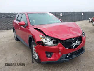 2014 Mazda CX-5 Touring with VIN JM3KE4CYXE0425274, listed as a IAAI auction lot 41510678 with 78,431 mi miles. Bid and sale history available at carsss.com. Image 1.