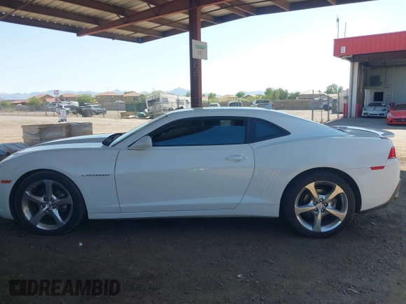 2014 Chevrolet Camaro LT z VIN 2G1FB1E32E9315353, wystawiony jako IAAI lot #42465033 z przebiegiem 103 863 mil mil oraz . Historia ofert i sprzedaży dostępna na DreamBid. Obrazek 14.