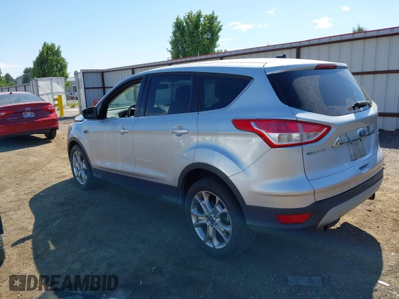 2013 Ford Escape SEL with VIN 1FMCU0H96DUA30733, listed as a IAAI auction lot 42737439 with 106,651 mi miles and . Bid and sale history available at DreamBid. Image 3.