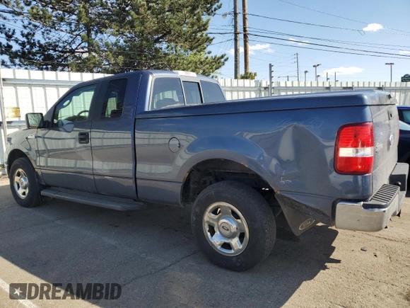 2005 Ford F-150 XLT with VIN 1FTPX14595NA25303, listed as a Copart auction lot 50960805 with 223,385 mi miles and Salvage Title. Bid and sale history available at carsss.com. Image 2.