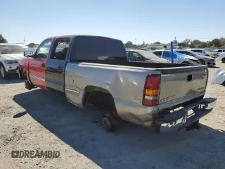 2002 GMC Sierra 1500HD SLE z VIN 1GTGK13U52F205875, wystawiony jako Copart lot #73240284 z przebiegiem Nie podano mil oraz Szkody całkowita. Historia ofert i sprzedaży dostępna na DreamBid. Obrazek 2.