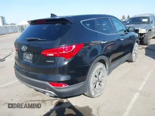 2016 Hyundai Santa Fe z VIN 5XYZT3LB6GG379054, wystawiony jako IAAI lot #42406174 z przebiegiem 182 073 mil mil oraz . Historia ofert i sprzedaży dostępna na DreamBid. Obrazek 4.