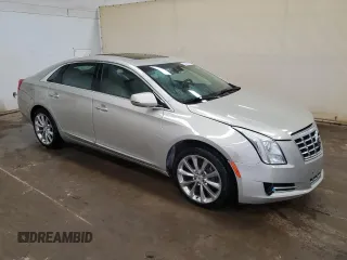 2013 Cadillac XTS Luxury with VIN 2G61R5S33D9166106, listed as a Copart auction lot 50535485 with 129,745 mi miles and Clean title. Bid and sale history available at DreamBid. Image 4.