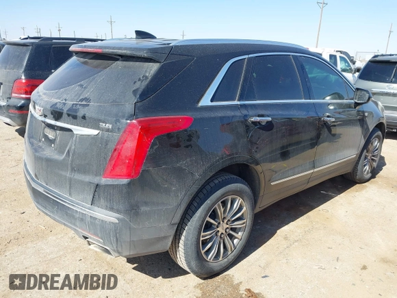 2017 Cadillac XT5 Luxury FWD with VIN 1GYKNBRS8HZ248217, listed as a IAAI auction lot 41626906 with 92,152 mi miles. Bid and sale history available at carsss.com. Image 4.